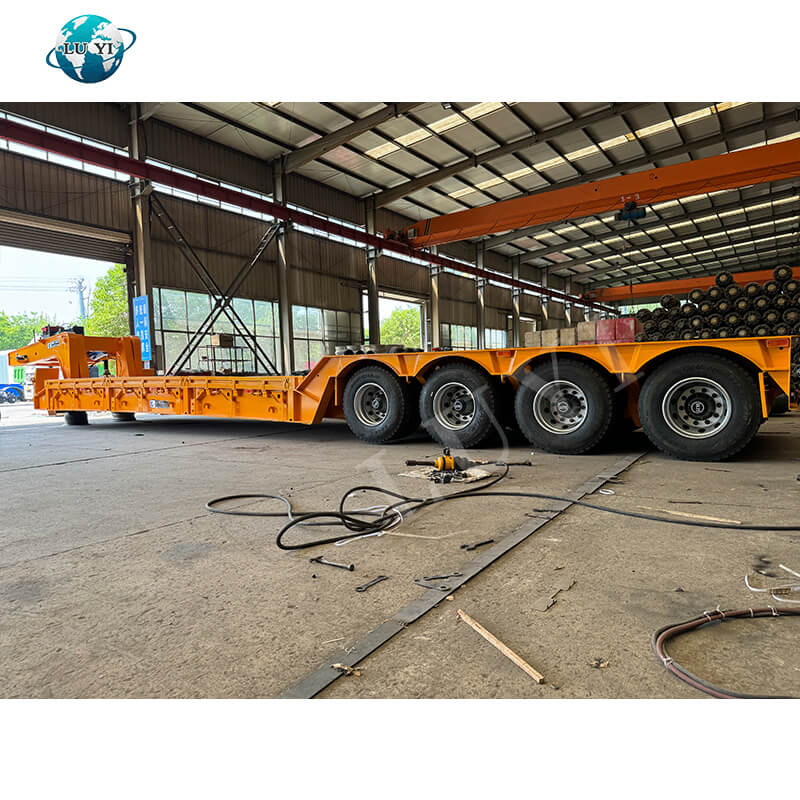 4-एक्सल 100-टन लो-बेड गूज़नेक सेमी-ट्रेलर ट्रक